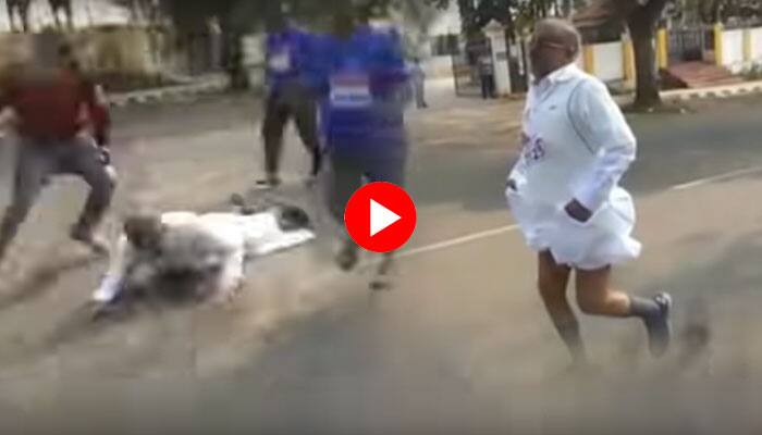 மாரத்தானில் கால் தடுக்கி தவறி விழுந்த அமைச்சர்! வைரலாகும் வீடியோ! மாரத்தானில் கால் தடுக்கி தவறி விழுந்த அமைச்சர்! வைரலாகும் வீடியோ!