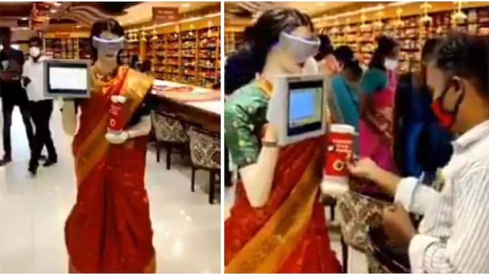 WATCH: வாடிக்கையாளர்களுக்கு சானிடைஸர் வழங்கும் பெண் ரோபோ..! WATCH: வாடிக்கையாளர்களுக்கு சானிடைஸர் வழங்கும் பெண் ரோபோ..!