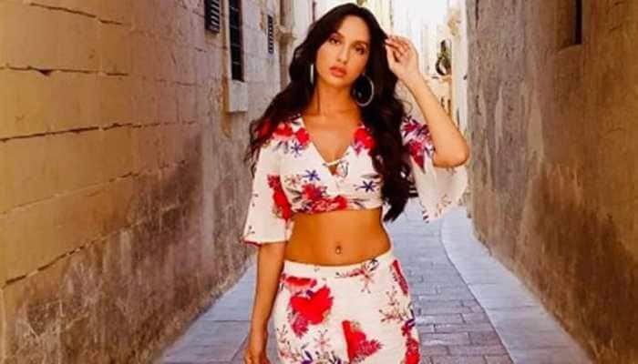 Photo gallery on Nora Fatehi`s pictures heat up social media! | Nora