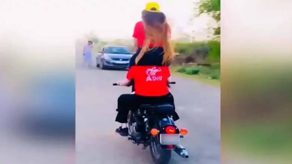 Bike Stunting Women Video Goes Viral And The Both Teenagers Fined Rupees For This Bike