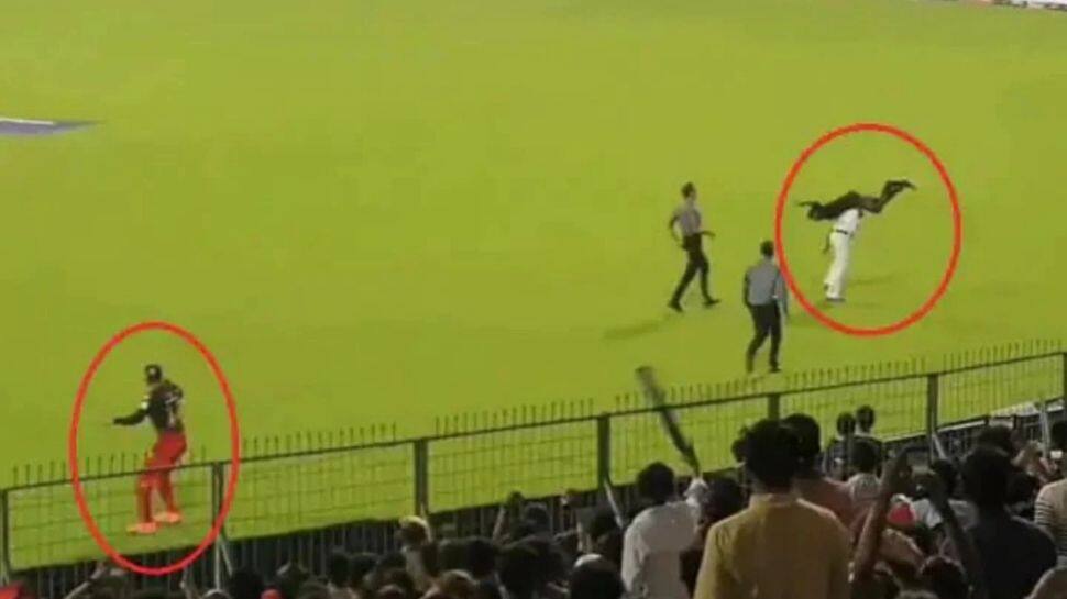 மைதானத்தில் புகுந்த ரசிகரை தூக்கிய பாகுபலி போலீஸ் - கோலியின் WWE ரியாக்ஷன்