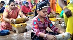 ஆடி முதல் வெள்ளி: 500 கிலோ மஞ்சள் 51 அம்மியில் அரைத்து வழிபாடு