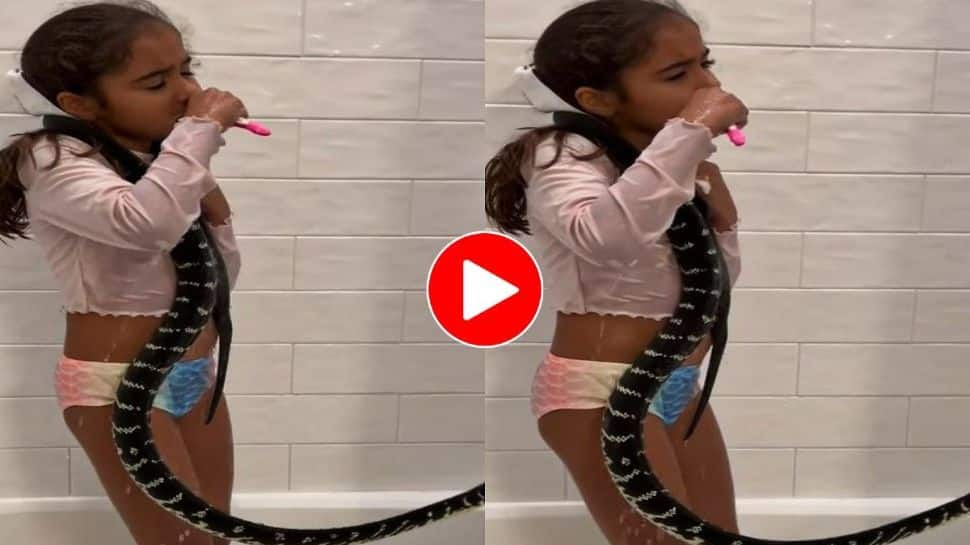 Viral Snake Video: Girl Wraps Dangerous Snake in Neck and Brushes Teeth ...