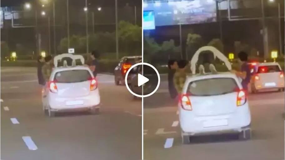 Video shows man doing push ups on top of moving car goes viral | ஒரே ...