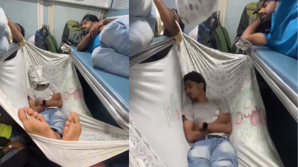 கூட்டமான ரயிலில் அந்தரத்தில் தொங்கியபடி ஜம்முன்னு தூங்கும் பயணி..வைரல் வீடியோ..!