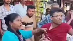 கணவனை ரோட்டில் இழுத்து போட்டு அடித்த மனைவி..Why this கொலவெறி? வைரல் வீடியோ..