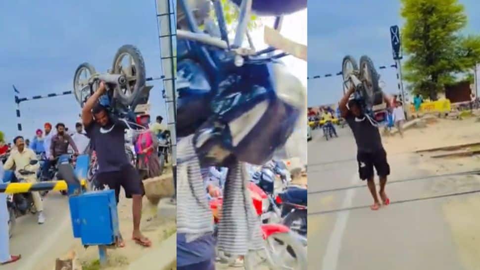 112 கிலோ பைக்கை..அசால்டாக சுமந்து சென்ற நபர்! ஷாக் கொடுக்கும் காரணம்-வைரல் வீடியோ