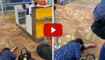 விமானத்தில் ஏற அனுமதிக்காததால் பீதியடைந்த பெண் மயக்கம் வீடியோ வைரல்