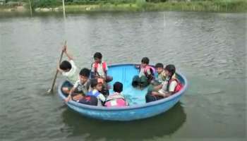   பரிசல் ஓட்டி பள்ளிக்கூடத்துக்கு போகும் பிஞ்சுகள்- கிருஷ்ணகிரியில் ஓர் தண்ணீர் தீவு!