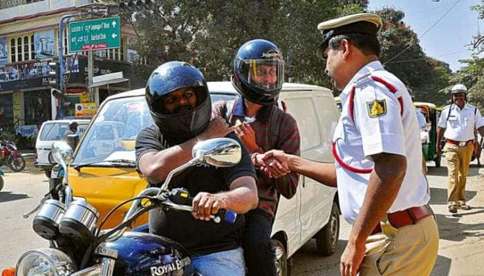 பைக்கில் செல்லும் இருவருக்கும் ஹெல்மெட் கட்டாயம் -HC..! 