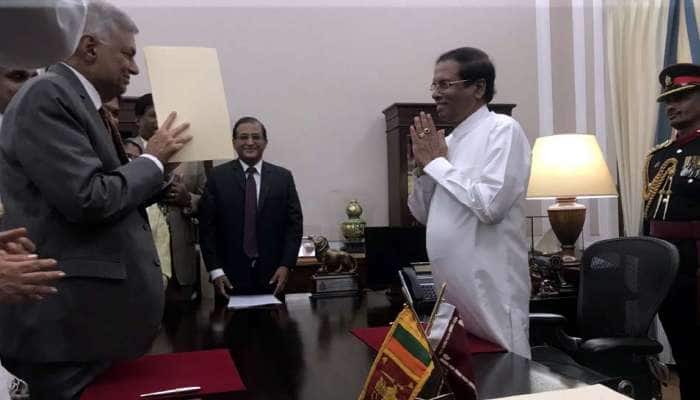 இலங்கையின் பிரதமராக மீண்டும் பதவியேற்றார் ரணில் விக்ரமசிங்கே! இலங்கையின் பிரதமராக மீண்டும் பதவியேற்றார் ரணில் விக்ரமசிங்கே!