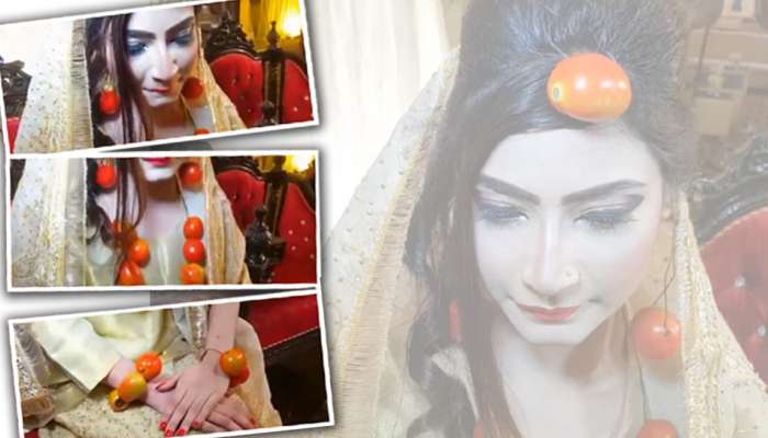 திருமணத்தின் பொது தங்க நகைக்கு பதில் தக்காளி அணிந்து வந்த மணப்பெண்! திருமணத்தின் பொது தங்க நகைக்கு பதில் தக்காளி அணிந்து வந்த மணப்பெண்!