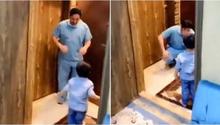 உணர்ச்சிபூர்வ வீடியோ: தனது மகனை கட்டியணைக்க முடியாமல் தவிக்கும் டாக்டர்! உணர்ச்சிபூர்வ வீடியோ: தனது மகனை கட்டியணைக்க முடியாமல் தவிக்கும் டாக்டர்!