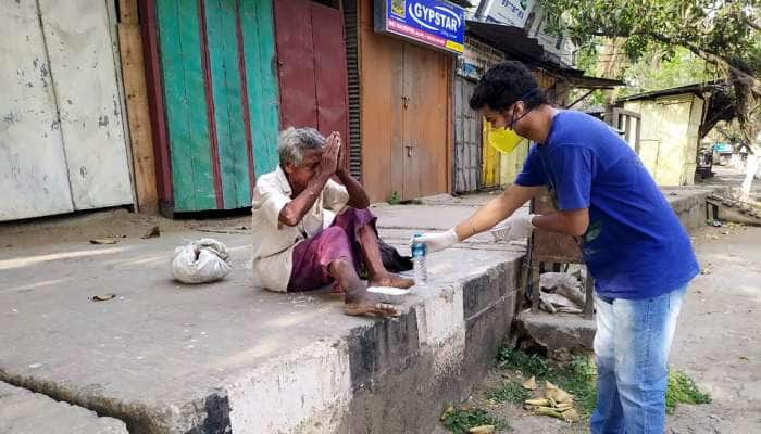 புலம்பெயர்ந்த தொழிலாளர்கள், காவலர்களுக்கு உணவு அளித்த நபருக்கு கொரோனா...