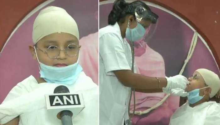 COVID Test-க்கு போன குட்டி காந்தி: இணையத்தில் இதயங்களை வெல்லும் சிறுவனின் படங்கள்!! COVID Test-க்கு போன குட்டி காந்தி: இணையத்தில் இதயங்களை வெல்லும் சிறுவனின் படங்கள்!!