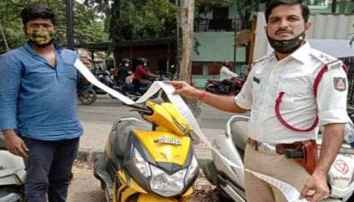 Helmet அணியாமல் பயணம் செய்தவருக்கு கிடைத்த shock: 2 மீட்டர் சலான், Rs. 42,500 அபராதம்