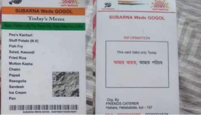 ஆதார் அட்டை போல் திருமணத்தின் மெனு கார்டை வடிவமைத்த ஜோடி; வைரலாகும் புகைப்படம்