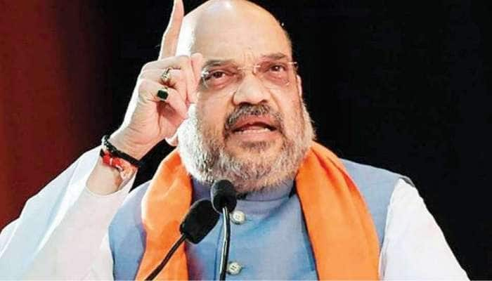 Amit Shah on Hijab: நீதிமன்ற உத்தரவை அனைவரும் பின்பற்ற வேண்டும் - அமித் ஷா  title=