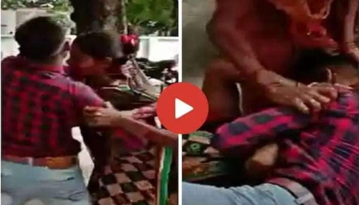 Viral Video: மண்டை உடையும் அளவு சண்டை போட்ட கணவன் மனைவி, காரணம் என்ன title=