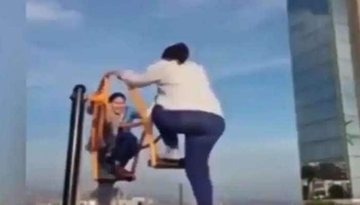 Funny Viral Video: Girls Fall on each other while swinging in Park