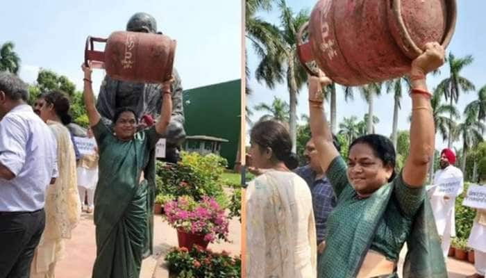 மோடி அரசை கண்டித்து 'பாகுபலி' ஸ்டைலில் சிலிண்டரை தூங்கிய பெண் எம்.பி title=