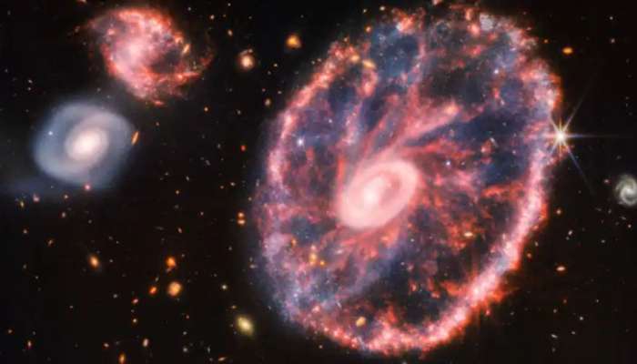 Cartwheel Galaxy: சுழலும் வண்ண வளையத்தை வெளிப்படுத்தும் கார்ட்வீல் கேலக்ஸியின் புதிய படம்
