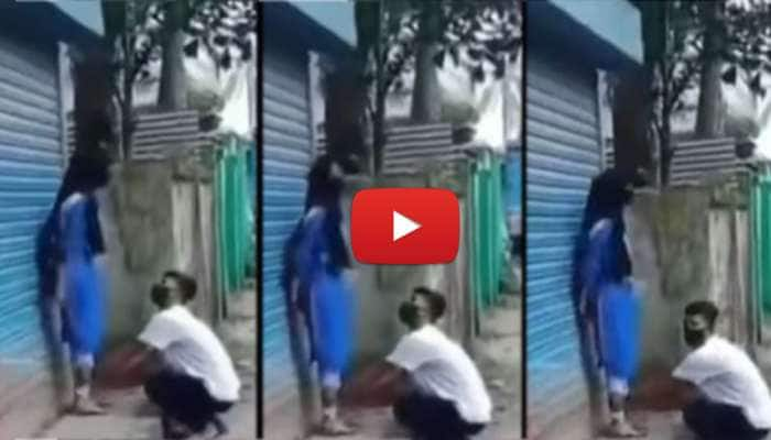 காதலியின் கால்களைப் பிடித்துக் கெஞ்சிய காதலன்.. என்ன நடந்தது - Viral Video