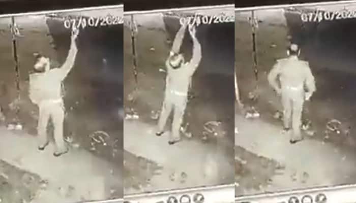 Video: பல்பை திருடி 'பல்ப்' வாங்கிய போலீஸ்; சிசிடிவியில் சிக்கியதால் சஸ்பெண்ட் - அதுக்கு அவர் சொன்ன காரணம் இருக்கே! title=