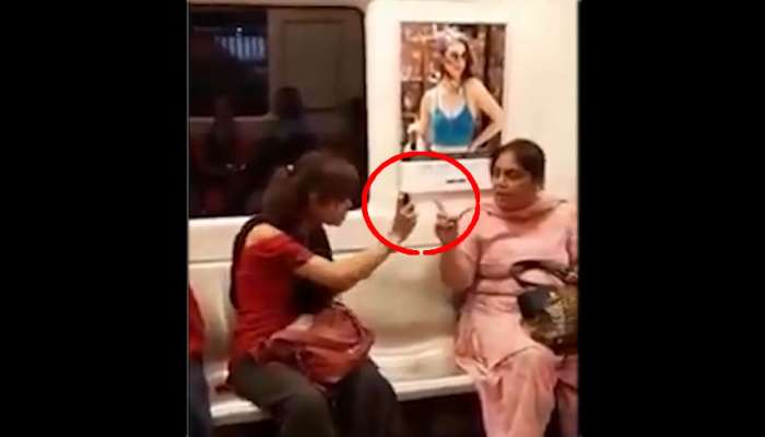 Delhi Metro Viral Video: டெல்லி மெட்ரோ வைரல் வீடியோ: இருக்கைக்காக சண்டையிட்ட இருபெண்கள்!