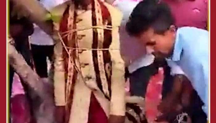 Shocking Viral Video: Groom Tied in Tree as he Demands Dowry