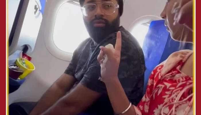 Funny Couple Viral Video: Husband Calls Air Hostess For Help after Fight With Wife